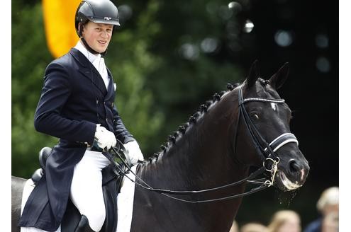 Der Champion und sein Wunderpferd Totilas. Foto: REUTERS/Ina Fassbender