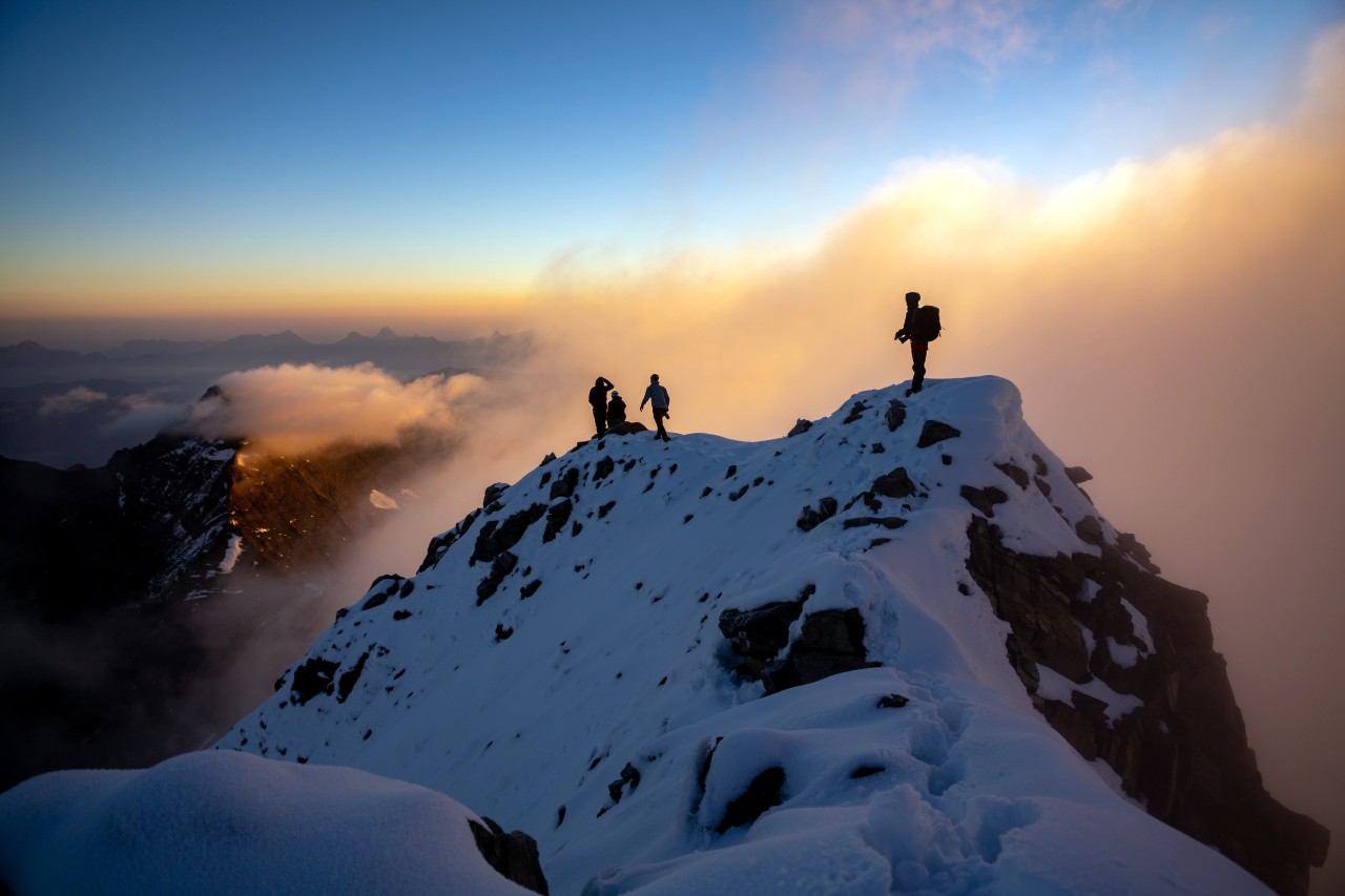 Bergsteiger auf dem Gipfel des Großen Wiesbachhorn. 