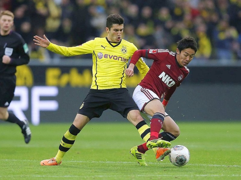 Borussia Dortmund ist auch in der Fußball-Bundesliga zurück auf Erfolgskurs. Eine Woche nach der ernüchternden Schlappe beim Hamburger SV (0:3) setzte sich die Mannschaft von Trainer Jürgen Klopp mit 3:0 (0:0) gegen den 1. FC Nürnberg durch. Wie schon beim famosen Champions-League-Auftritt vier Tage zuvor in St. Petersburg (4:2) präsentierte sich der BVB am Samstag von seiner besseren Seite und rückte auf Rang zwei vor. Vor 80 645 Zuschauern im ausverkauften Signal Iduna Park sorgten der nach dreiwöchiger Verletzungspause ins Team zurückgekehrte Mats Hummels (51. Minute), Robert Lewandowski (67.) und Henrich Mchitarjan (83.) für den verdienten Sieg.