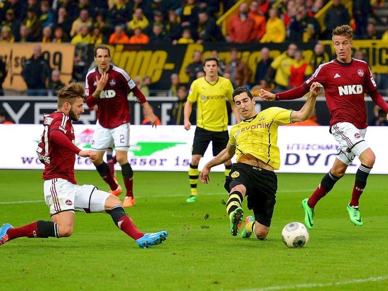 Borussia Dortmund ist auch in der Fußball-Bundesliga zurück auf Erfolgskurs. Eine Woche nach der ernüchternden Schlappe beim Hamburger SV (0:3) setzte sich die Mannschaft von Trainer Jürgen Klopp mit 3:0 (0:0) gegen den 1. FC Nürnberg durch. Wie schon beim famosen Champions-League-Auftritt vier Tage zuvor in St. Petersburg (4:2) präsentierte sich der BVB am Samstag von seiner besseren Seite und rückte auf Rang zwei vor. Vor 80 645 Zuschauern im ausverkauften Signal Iduna Park sorgten der nach dreiwöchiger Verletzungspause ins Team zurückgekehrte Mats Hummels (51. Minute), Robert Lewandowski (67.) und Henrich Mchitarjan (83.) für den verdienten Sieg.