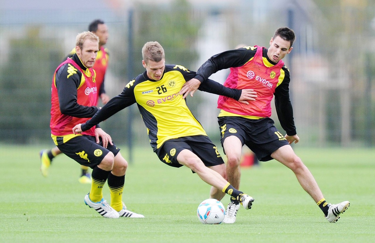 Florian Kringe (l.), Lukas Piszczek (m.) und Damien Le Tallec (r.) im Training des BVB 2009.