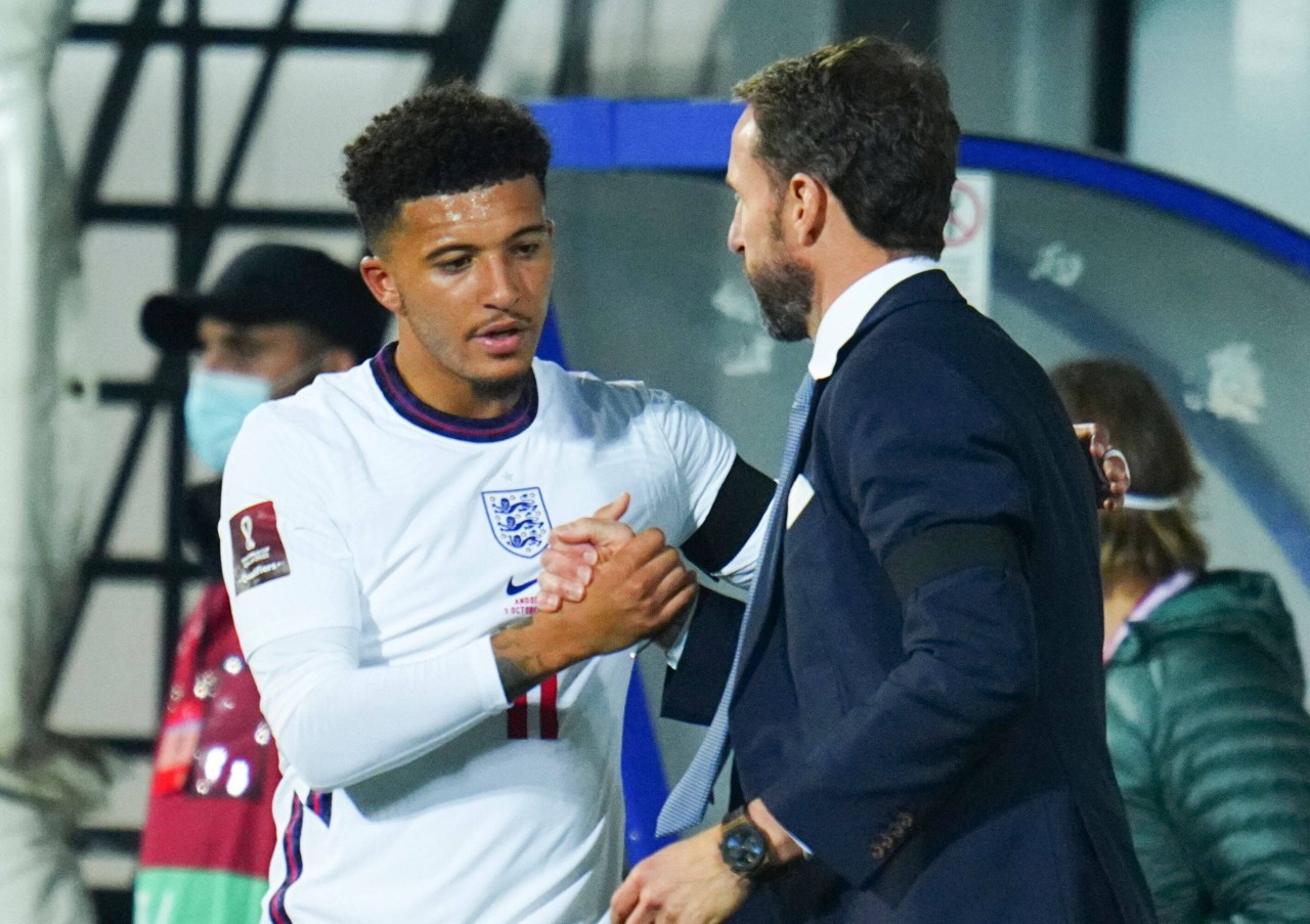 Jadon Sancho mit England-Trainer Gareth Southgate.