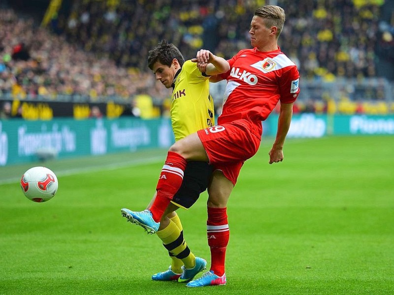 Borussia Dortmund gewinnt vor heimischem Publikum mit 4:2 gegen den FC Augsburg: Für den BVB erzielte Julian Schieber zwei Tore (22., 52.) - außerdem trafen Neven Subotic (64.) und Robert Lewandowski (90.). Für den FC Augsburg waren zwischenzeitlich noch Daniel Baier (43.) und Kevin Vogt (45.) erfolgreich.