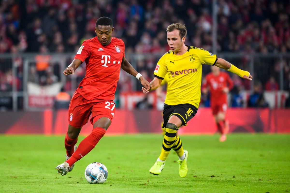 Mario Götze beim BVB im Duell mit David Alaba beim FC Bayern München